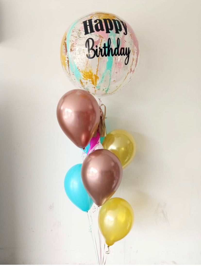 Arreglo de globos con globo burbuja